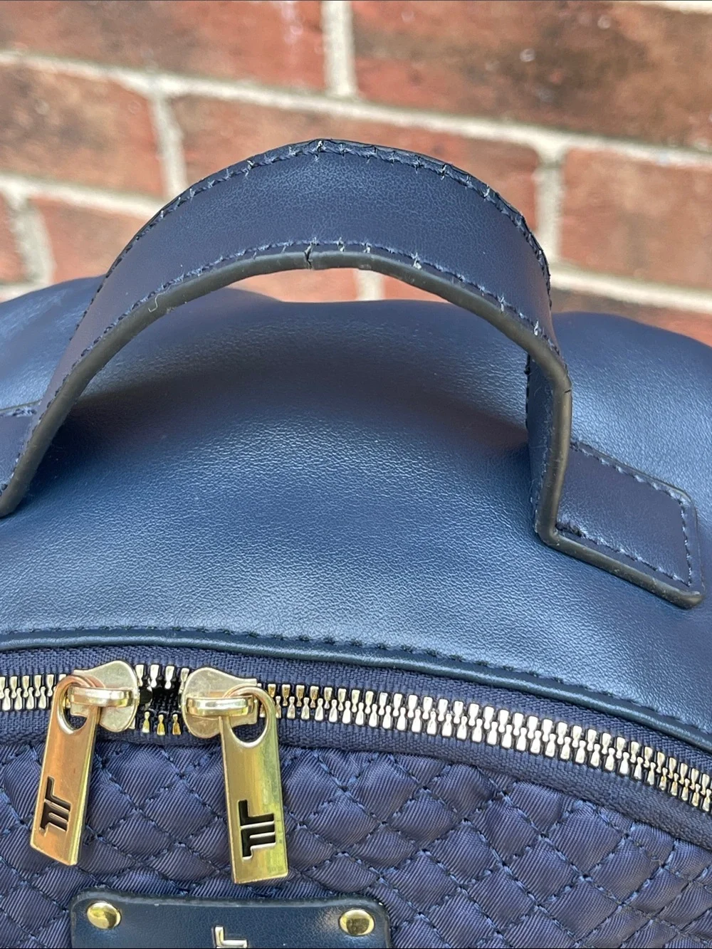 London Fog Quilted Navy Unisex Backpack with Gold Hardware